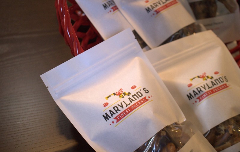 Cinnamon Roll Flavored candied pecans –  Offered in 8 delicious flavors