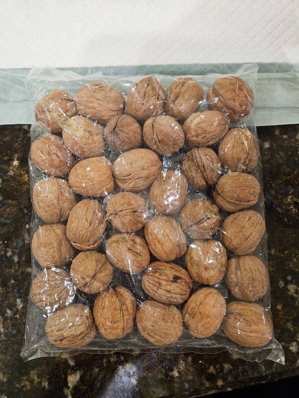 Nuts Galore Whole walnuts in their shell. Sealed bag. 16 Oz Bag. (454g)